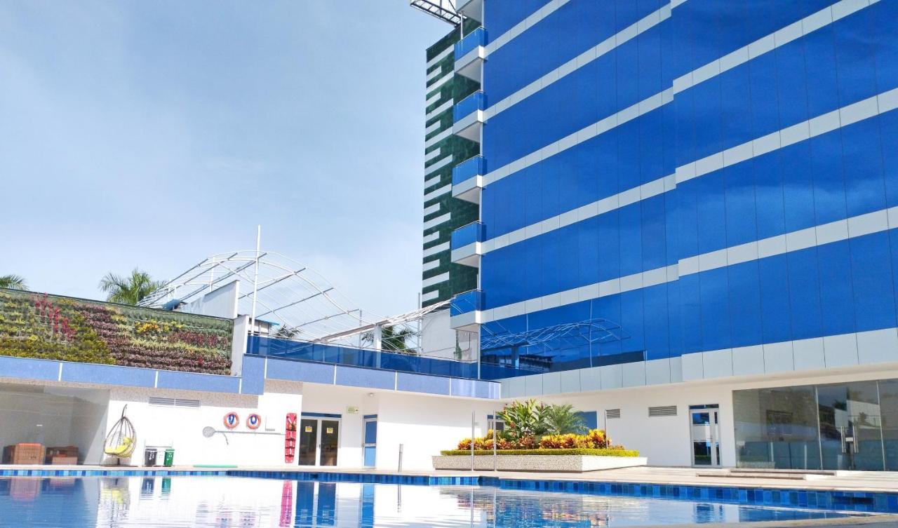 Hotel Royal Elim International San Antonio (Palmira) Exterior foto The pool at the hotel