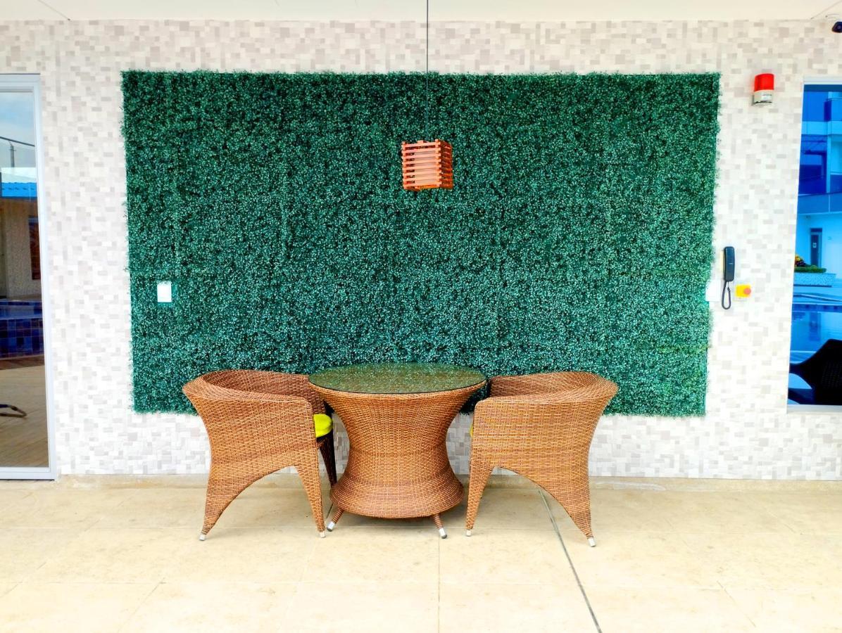 Hotel Royal Elim International San Antonio (Palmira) Exterior foto Artificial green wall
