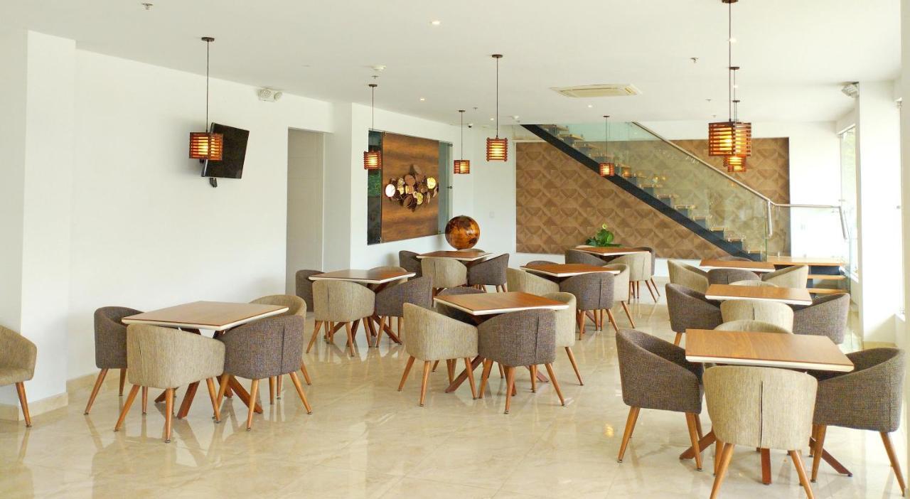 Hotel Royal Elim International San Antonio (Palmira) Exterior foto The interior of the restaurant